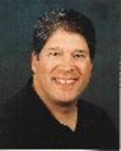 Headshot of Ernie Falcon