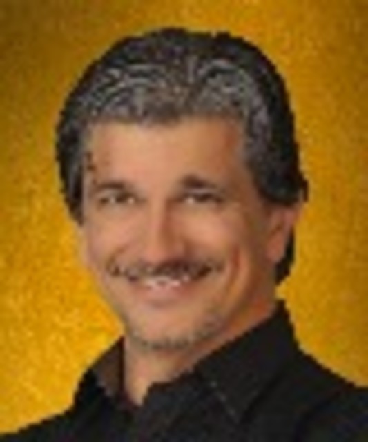 Headshot of Greg Beckham