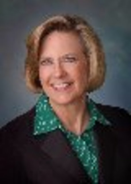 Headshot of Kris Anderson-Manos