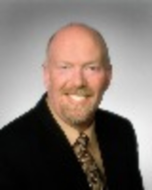 Headshot of Mark Hutchins