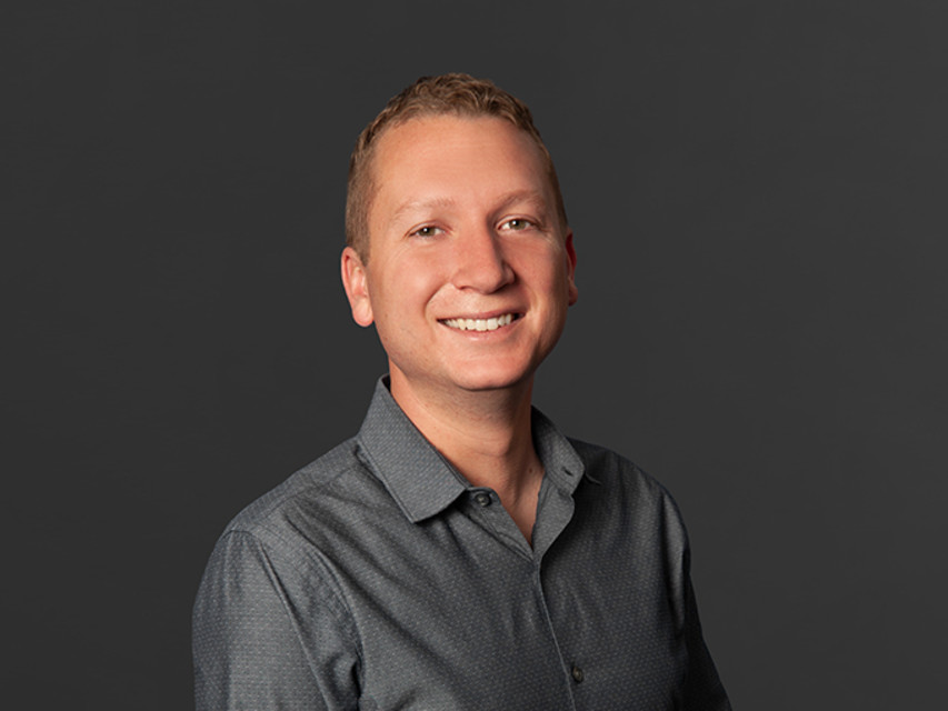 Headshot of Jordan Schlau