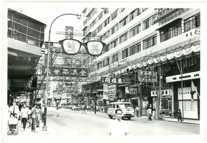 Photograph, streetscape with neon signs, Hong Kong ([1960s