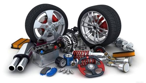 Mechanic working with automotive components