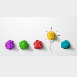 coloured balls ith sketch of light bulb