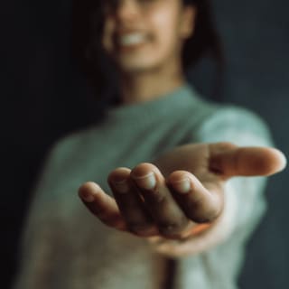 blurred image of woman waving
