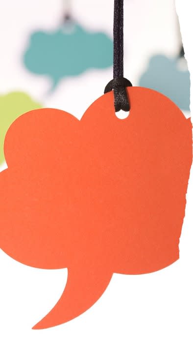 orange speech bubble hanging up 