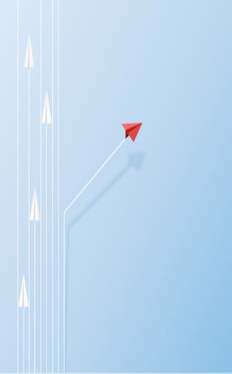 red paper airplane veering off