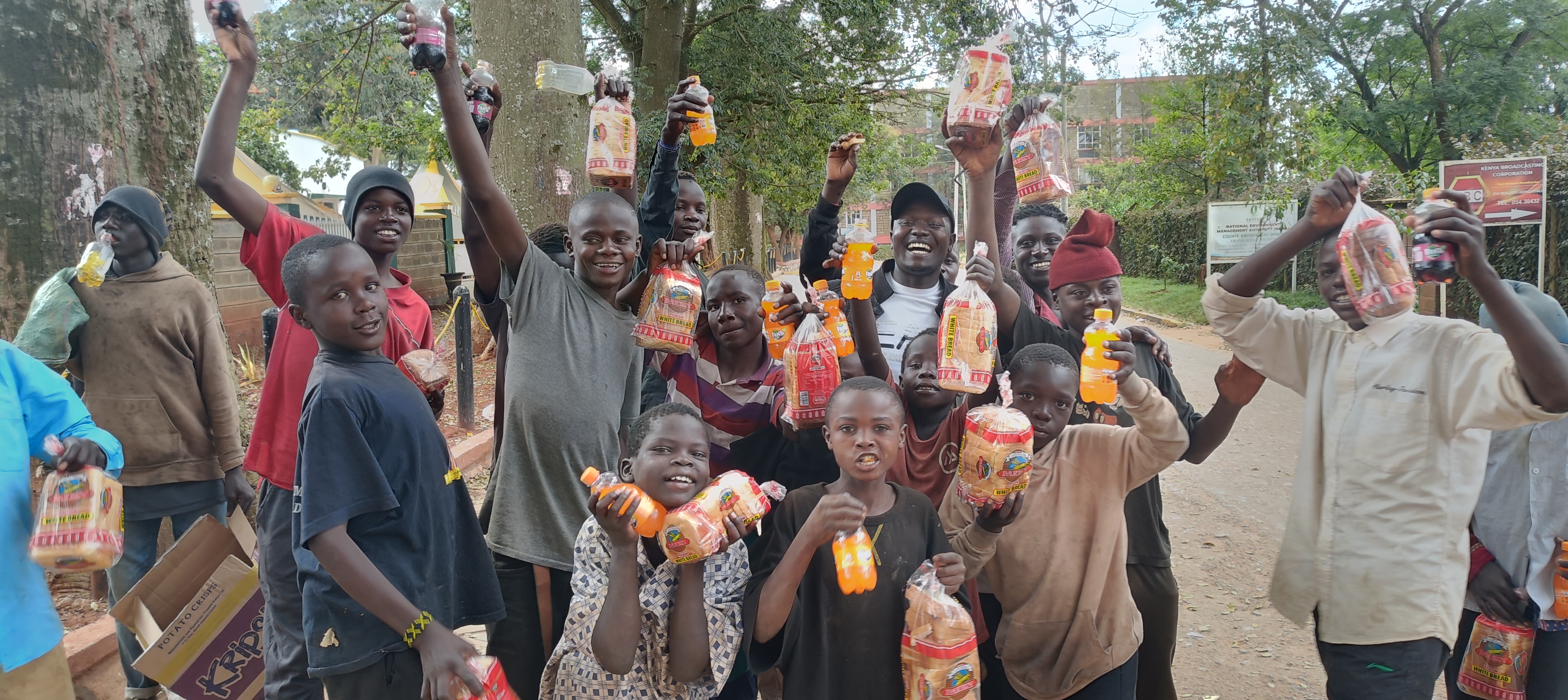 Christmas with street family - sharing bread and soda