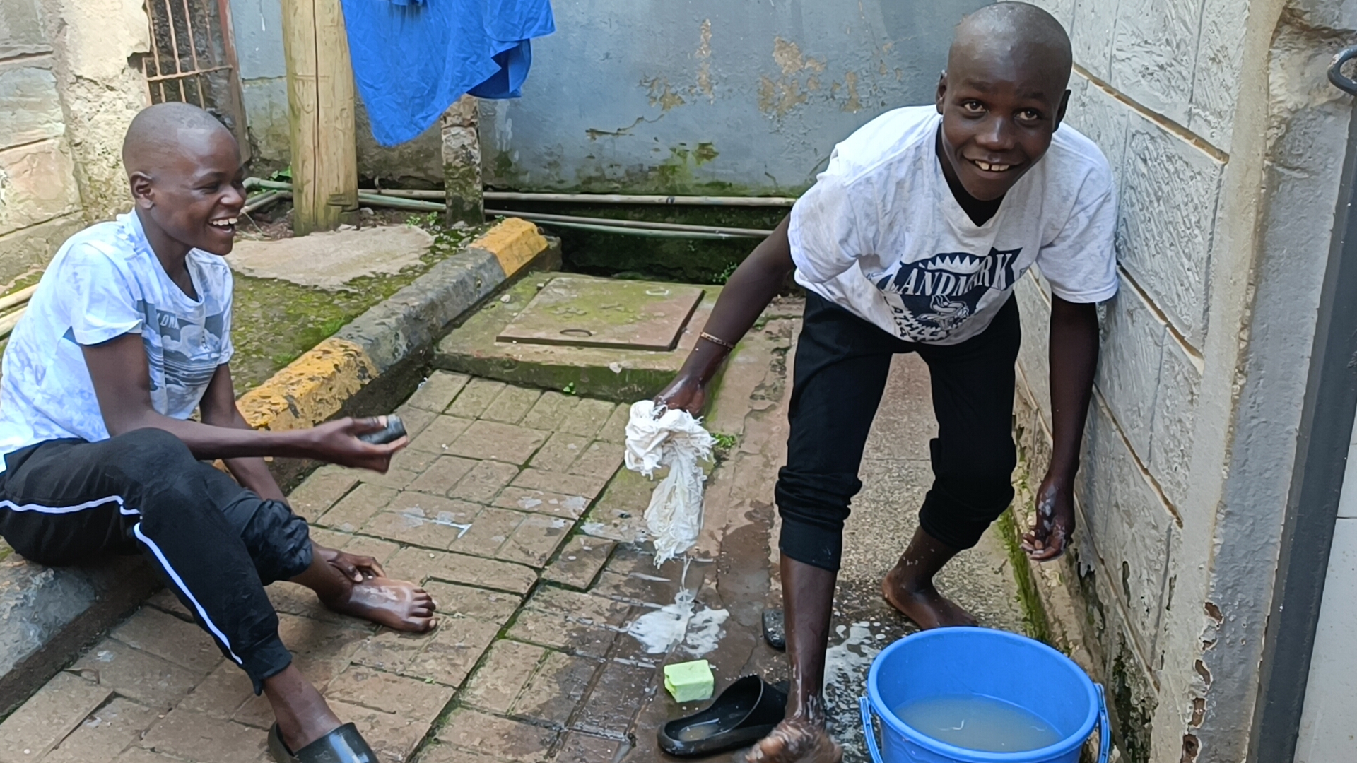 Street children taking bath - hygiene care