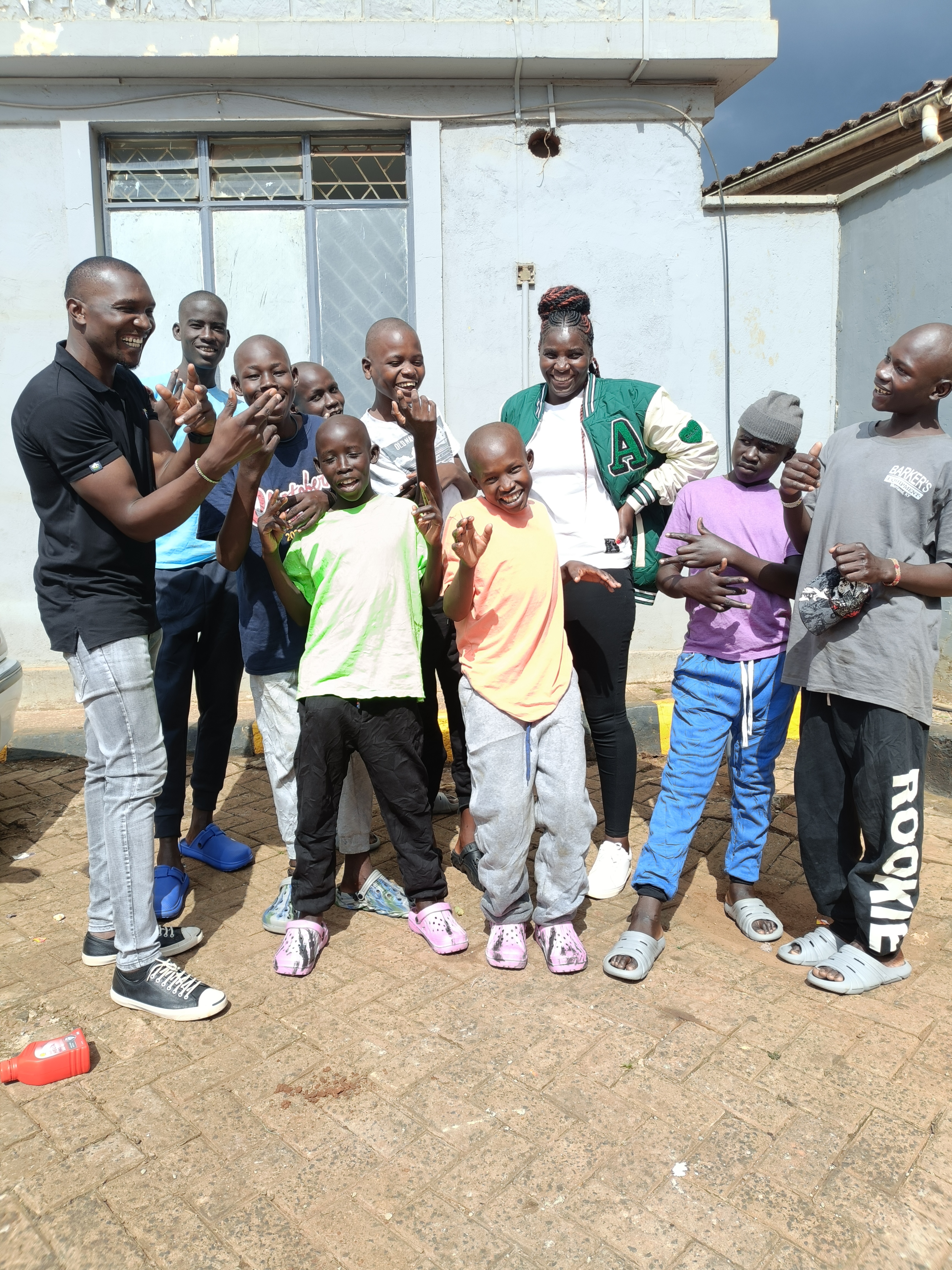 Street children after cleaning and new clothes - Love In Action Kitale