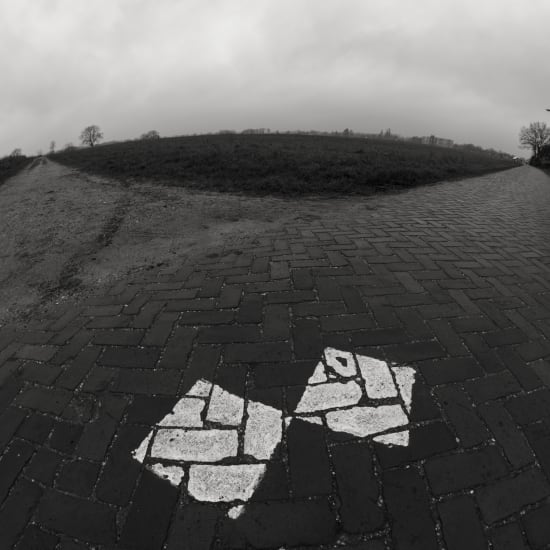 Photograph of a geospatial marker with a fisheye field of view.