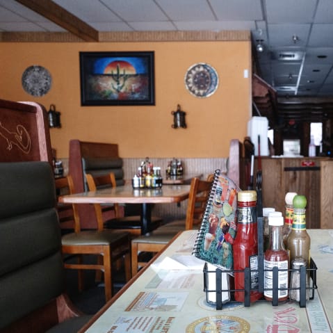 INside of a mexican restaurant looks desolate
