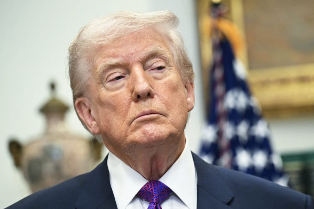 President Donald Trump looks on in the Roosevelt Room of the White House.