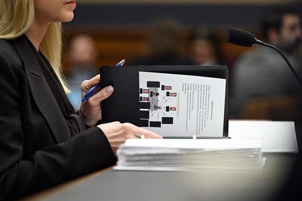 Attorney General Pam Bondi takes her seat before testifying before a House Judiciary Committee hearing on "Oversight of the Department of Justice" on Capitol Hill.