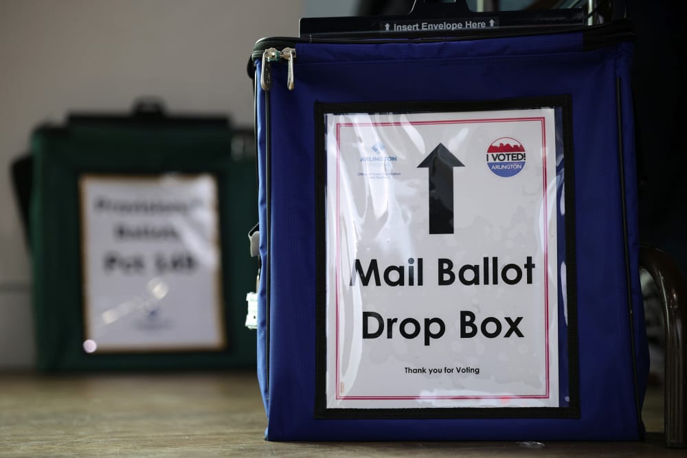 A mail ballot drop box is seen at a polling station
