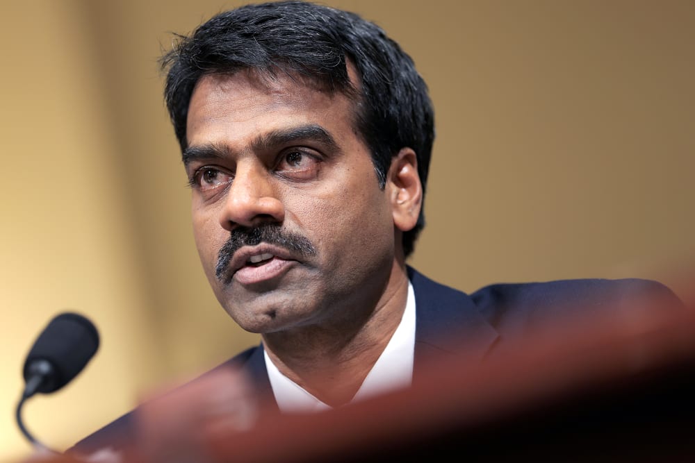 Madhu Gottumukkala's face is seen in a closeup frame-shot from below and diagonally.