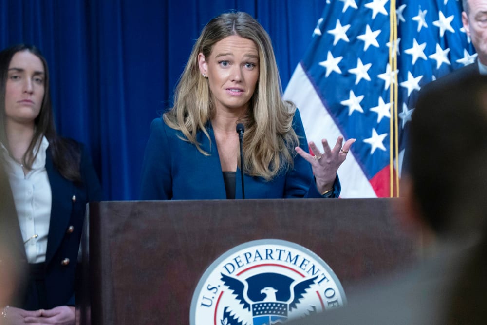 Tricia McLaughlin gestures with her hand as he speaks during a presser.