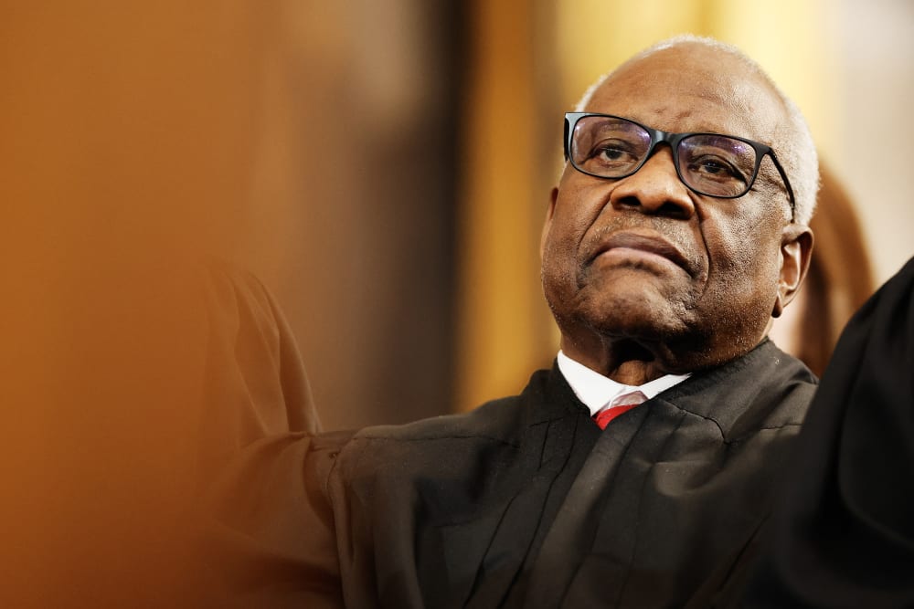 Justice Thomas watches Donald Trump's inauguration as he sits in the crowd.