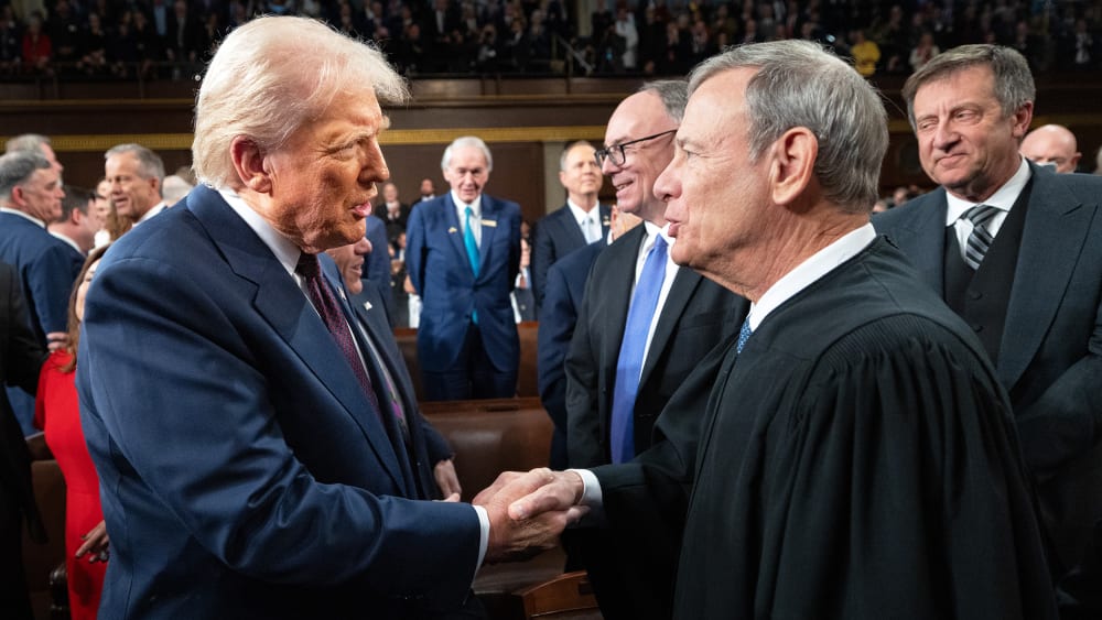 President Donald Trump greets Chief Justice of the United States John G. Roberts Jr.