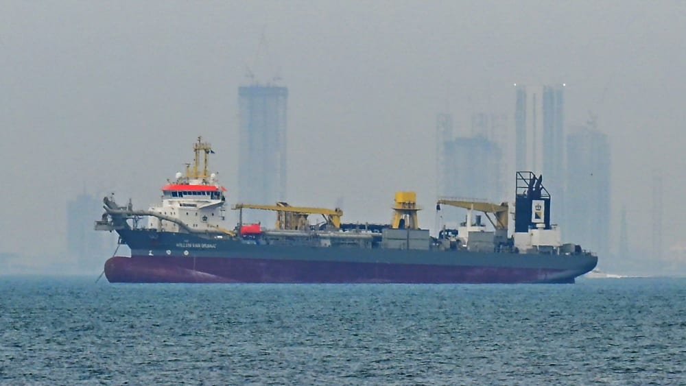 A commercial ship is anchored off the coast of the United Arab Emirates, in the Strait of Hormuz.