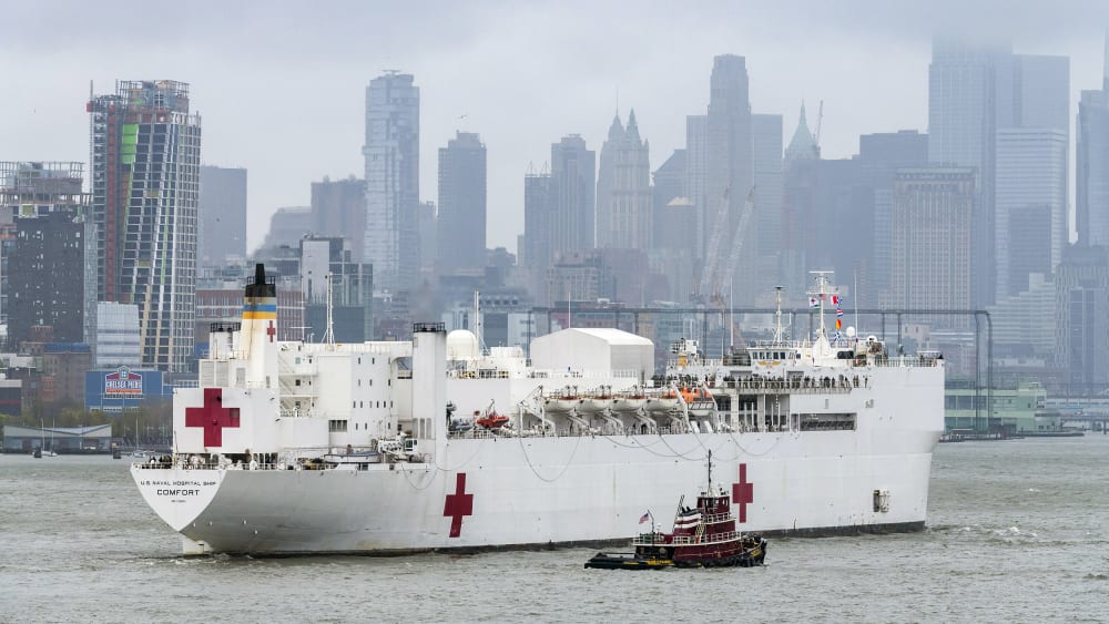 U.S. Navy hospital ship Comfort departs from Manhattan.