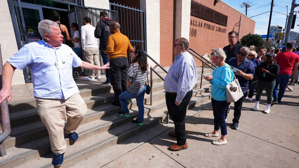 Voters stand in line to vote early for the primary election on Feb. 17, 2026 in Dallas.