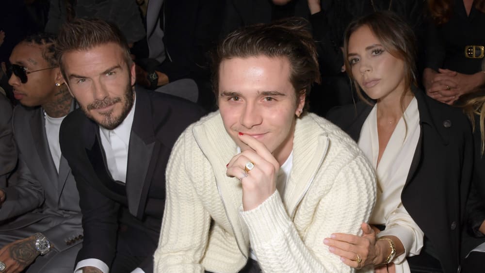 From left, David Beckham, Brooklyn Beckham and Victoria Beckham.