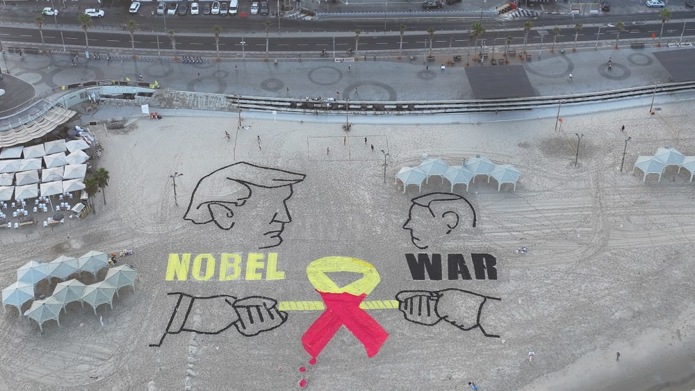 An aerial view of drawings as a group of activists in Israel staged a protest near the U.S. Embassy in Tel Aviv calling for a cease-fire in Gaza and the return of Israeli hostages on Sept. 12, 2025.
