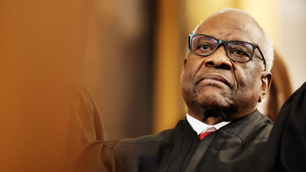 Justice Thomas watches Donald Trump's inauguration as he sits in the crowd.