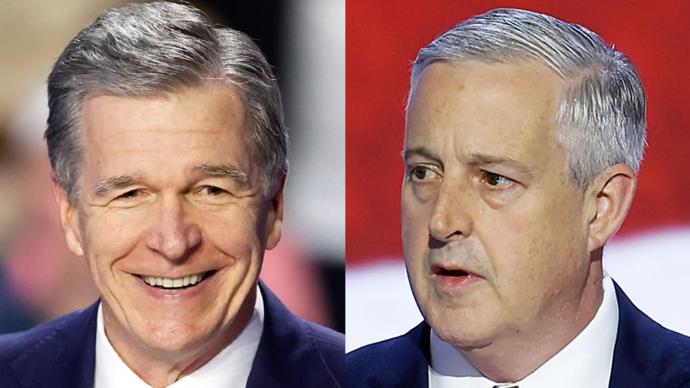 Roy Cooper; Michael Whatley.