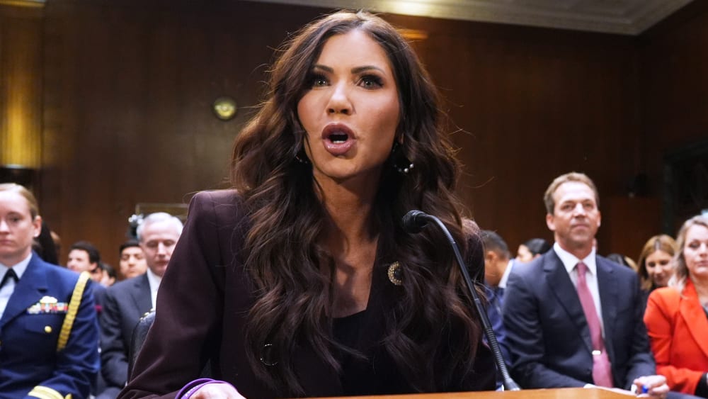 Kristi Noem speaks as she sits front of the committee.