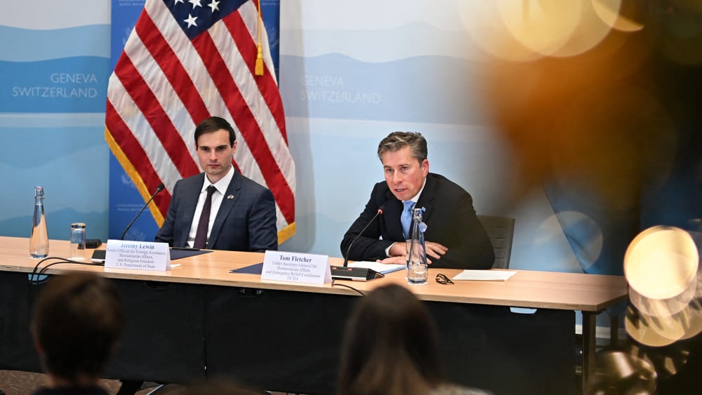 Jeremy Lewin, left, and Tom Fletcher at a signing ceremony.