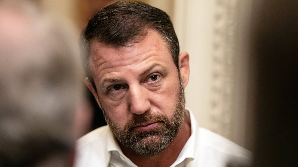 Sen. Markwayne Mullin speaks to reporters on Capitol Hill.