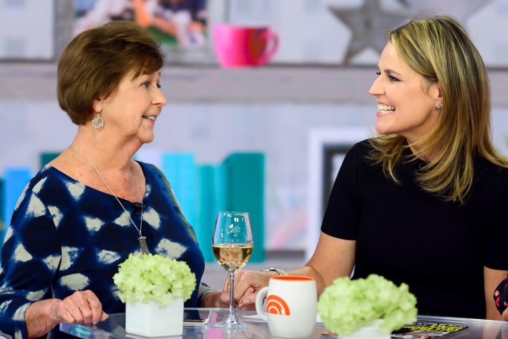 Savannah Guthrie, right, and her mom, Nancy, sit at a table in the TODAY studio.