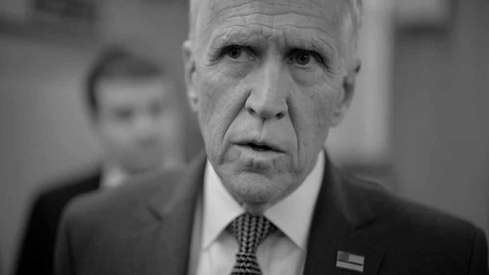A close up of Thom Tillis in black and white.
