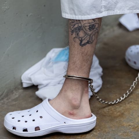 A prisoner's schackled feet is seen in an Salvadorian prison.