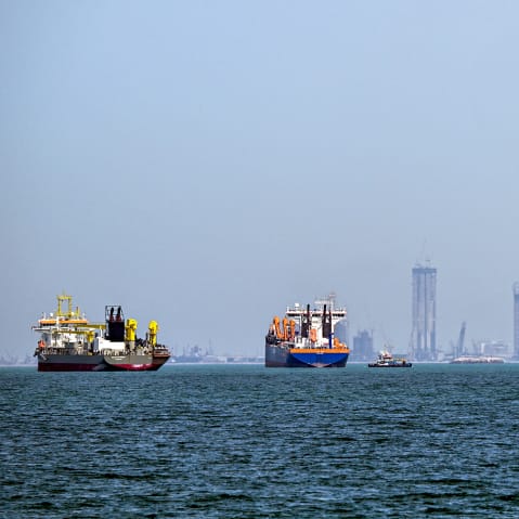 Commercial vessels are pictured offshore in Dubai.