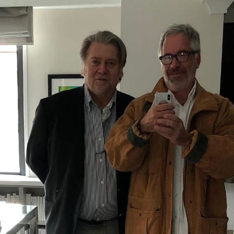 Jeffrey Epstein, right, takes a mirror selfie of him and Steve Bannon.
