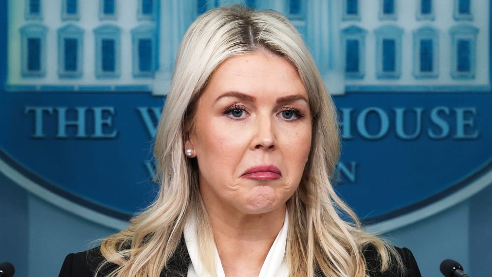 White House Press Secretary Karoline Leavitt reacts during a news briefing in the James S. Brady Press Briefing Room.