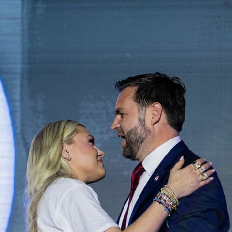 Erika Kirk and Vice President JD Vance embrace at the Pavilion at Ole Miss at the University of Mississippi.