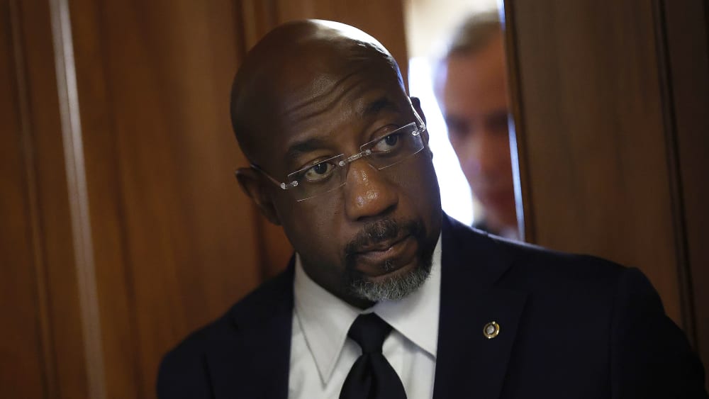 U.S. Sen. Raphael Warnock leaves a Senate Democratic meeting on Oct. 3, 2025 at the U.S. Capitol Building.