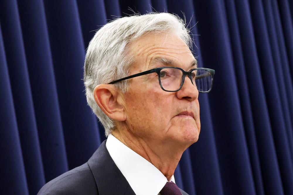 Jerome Powell speaking during a press conference.