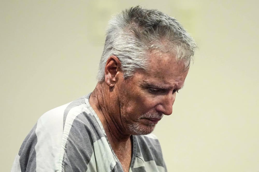 Colin Gray, 54, the father of Apalachee High School shooting suspect Colt Gray, 14, enters the Barrow County courthouse for his first appearance.