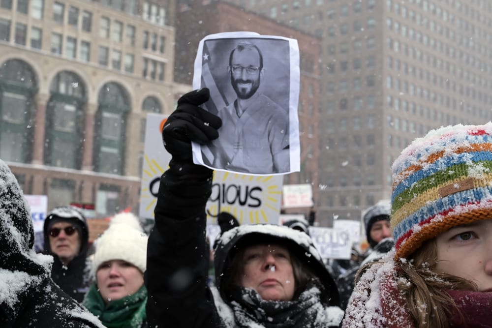 Demonstrators gather on Michigan Avenue to protest against U.S. Immigration and Customs Enforcement and Customs and Border Protection on Jan. 25, 2026, in Chicago.