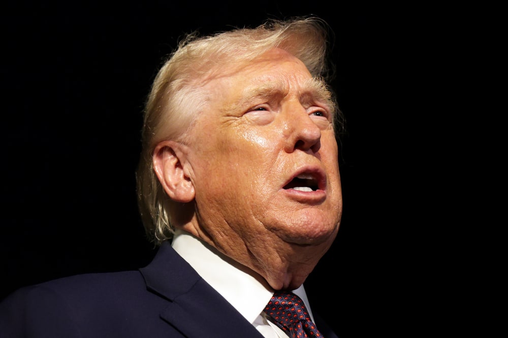 U.S. President Donald Trump speaks as he departs the White House on Dec. 19, 2025.