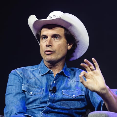 Kimbal Musk sits at the stage.