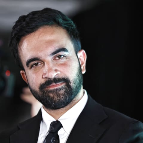 Zohrani Mamdani looks on at an event.