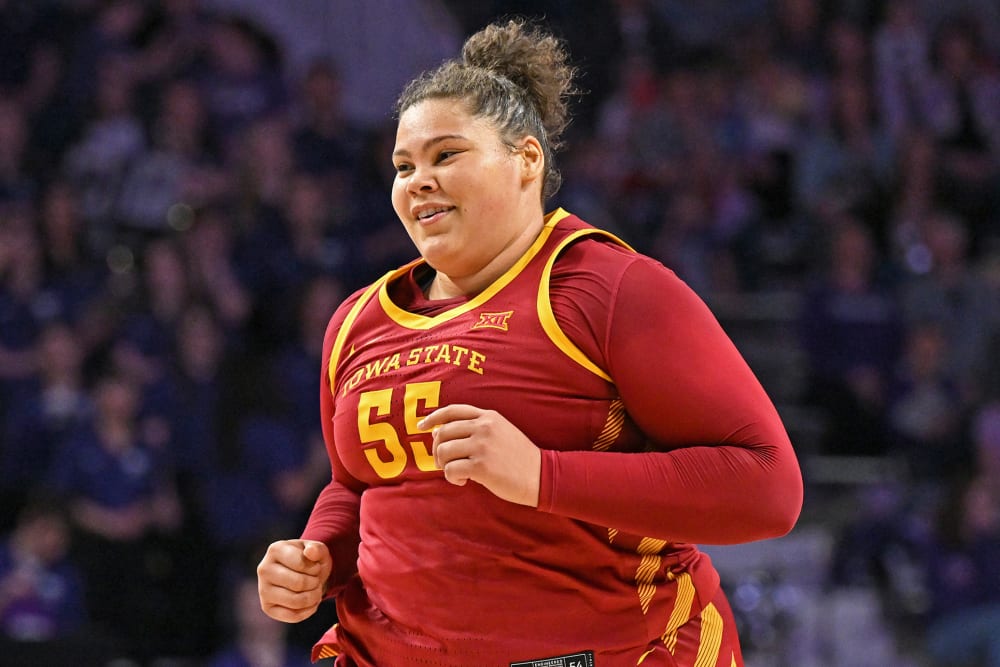 Audi Crooks #55 of the Iowa State Cyclones runs down court.