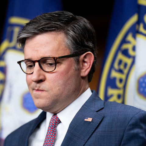 Mike Johnson looking down.