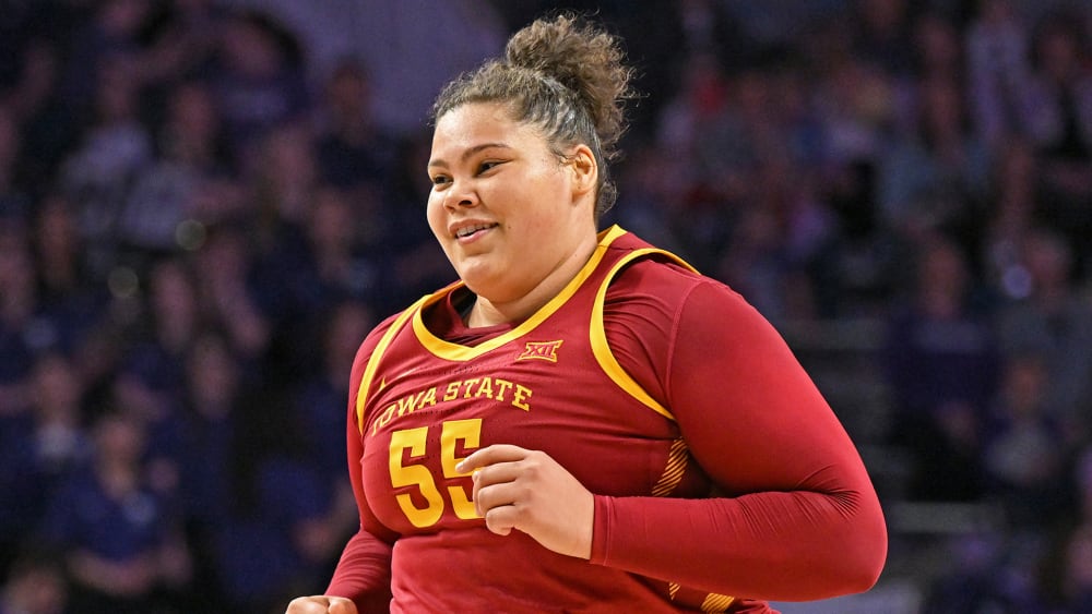Audi Crooks #55 of the Iowa State Cyclones runs down court.